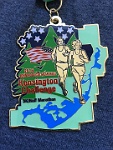 This guy must run like me. Notice the scabs on the knee and road rash on the calf! Ouch!! But still a nice medal.  2016-09-17 Ann Arbor Track Club, Kensington Challenge Half Marathon : Half Marathon, kasdorf, race, running